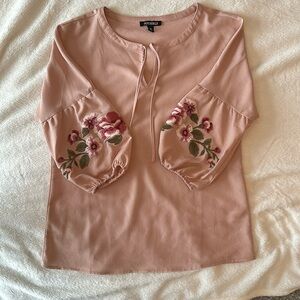 Light mauve blouse with floral detail